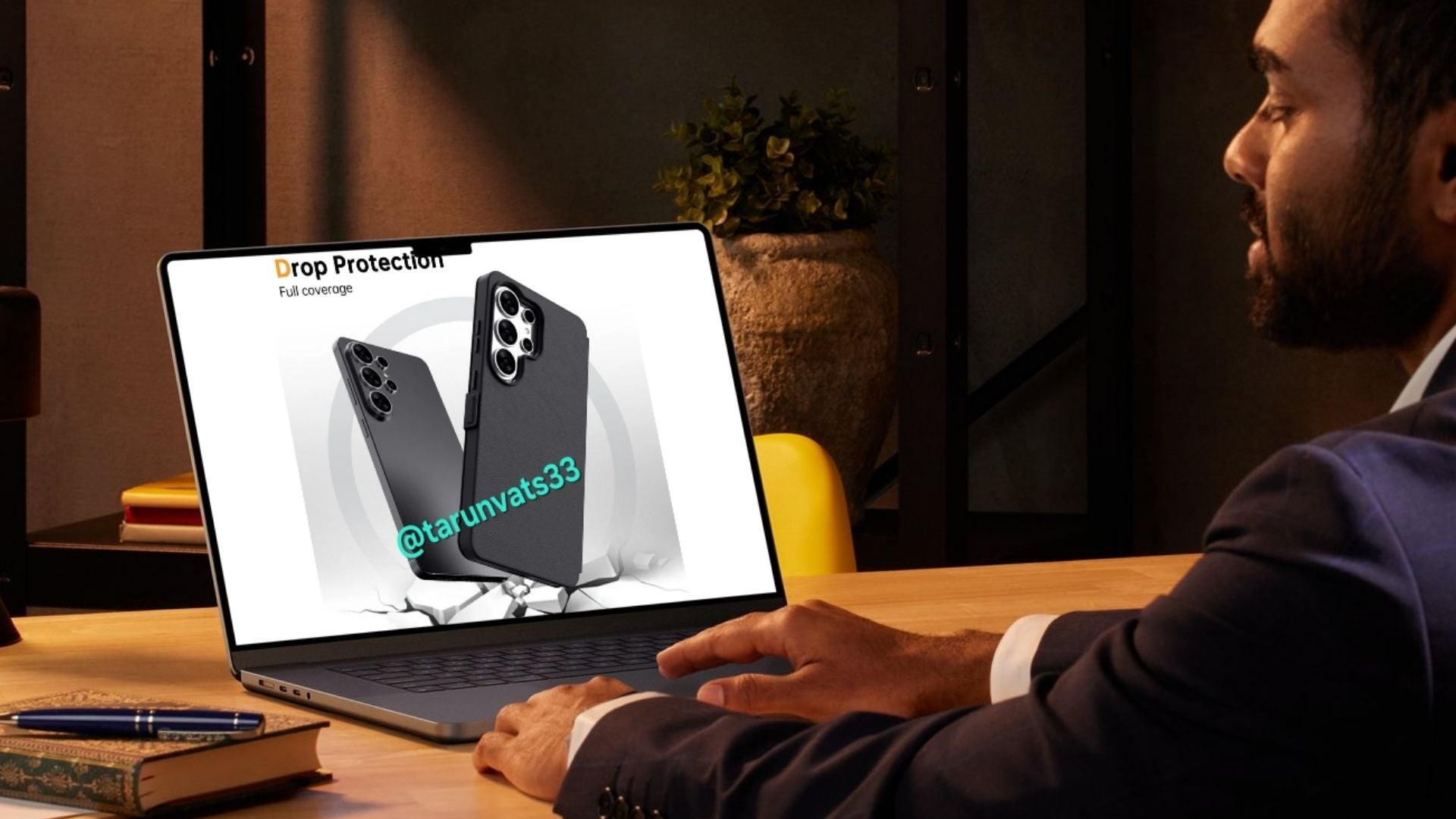 man in suit looking at the new Galaxy S26 Ultra case leak on a laptop