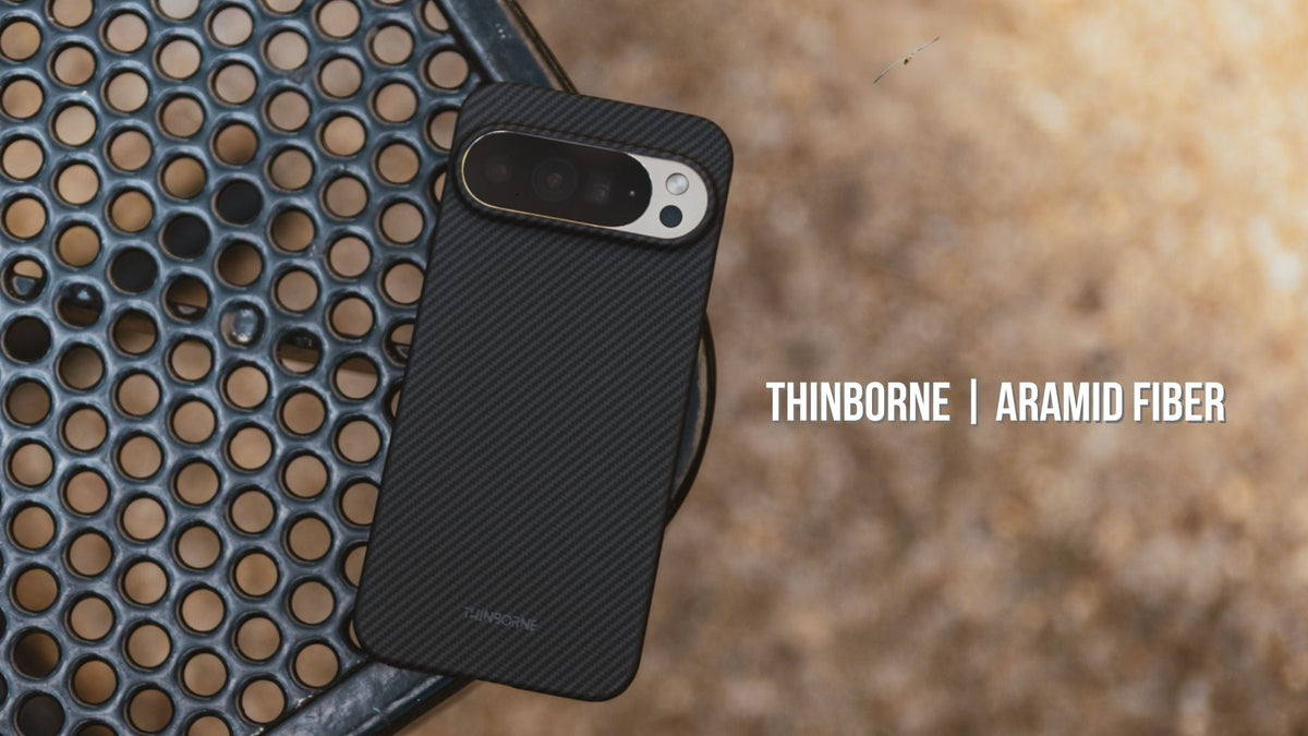 Thinborne aramid fiber classic black phone case on edge of steel surface