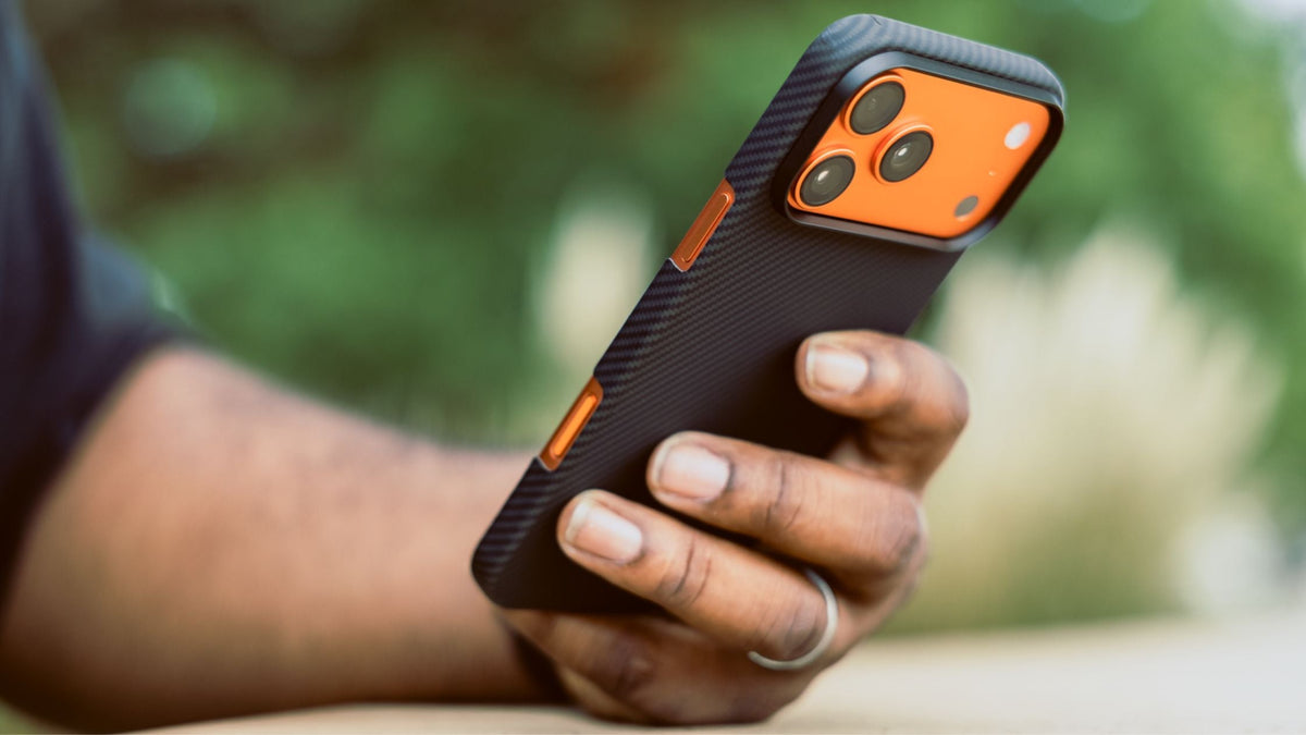 Person holding iPhone 17 Pro Max case with textured aramid fiber finish
