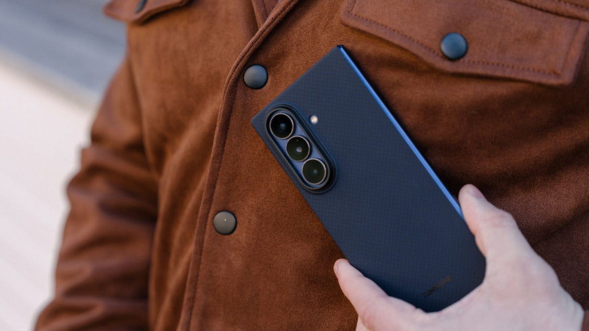 Man holding Galaxy Z Fold 7 in Thinborne case near his body