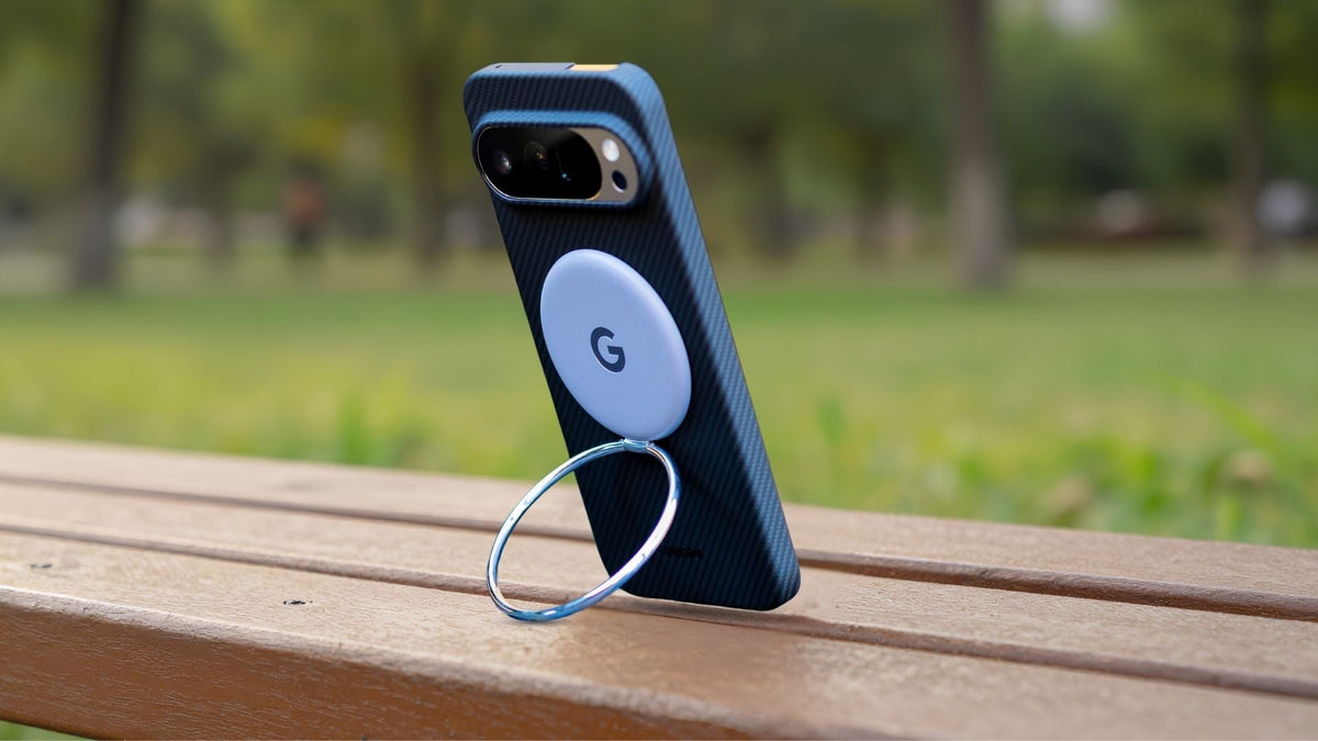Google Pixel 10 with MagSafe ring standing on a bench outdoors
