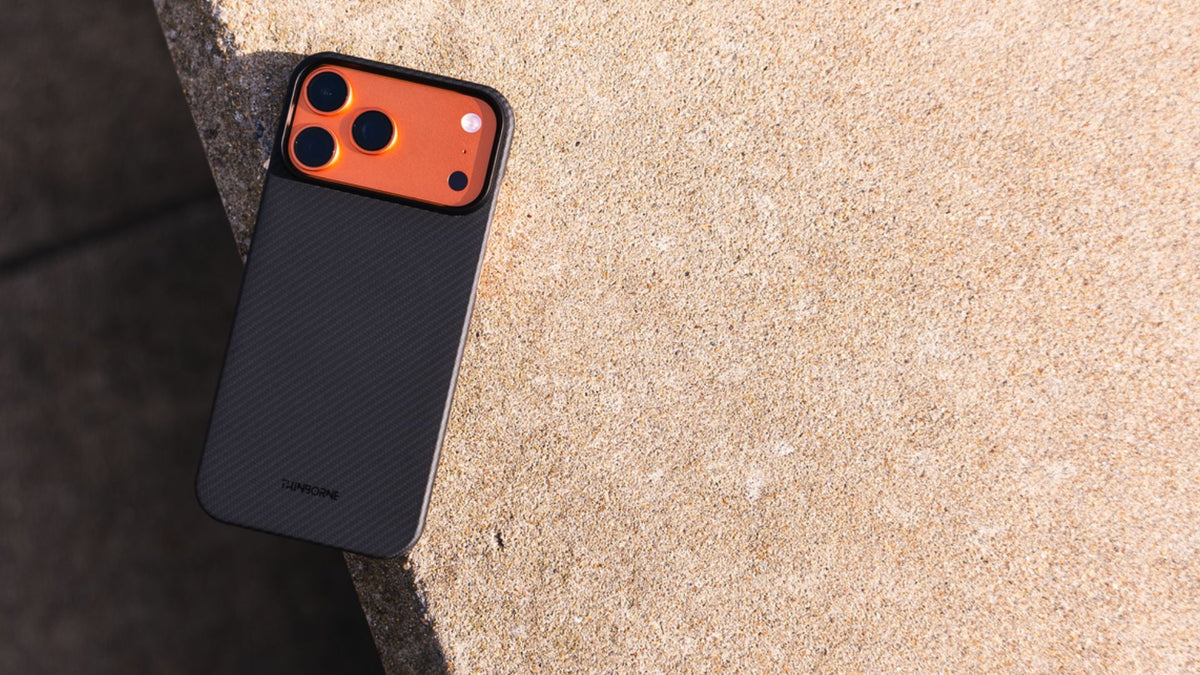 ThinBorne iPhone 17 Pro case laid on top of a concrete