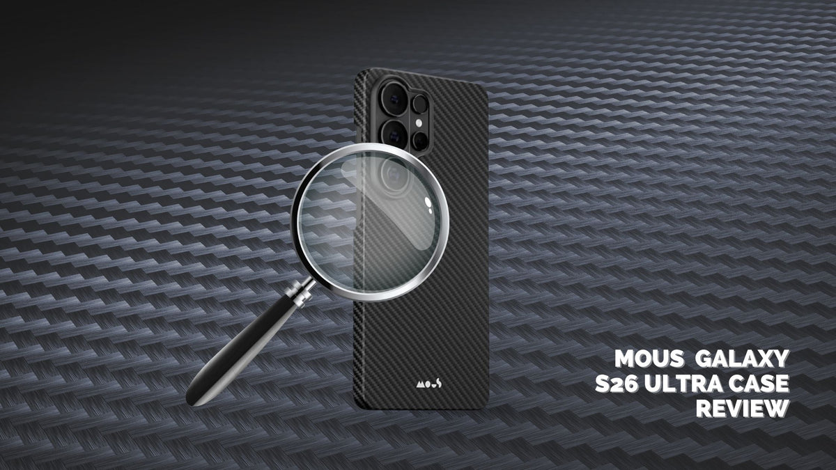 Magnifying glass over Galaxy S26 Ultra in black Mous aramid fiber case on aramid fiber background