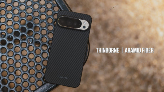 Thinborne aramid fiber classic black phone case on edge of steel surface