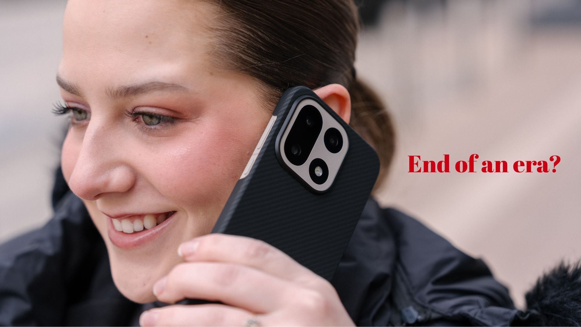 western woman smilig while on the phone Oneplus 15