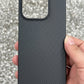 a hand holding oneplus 15 case