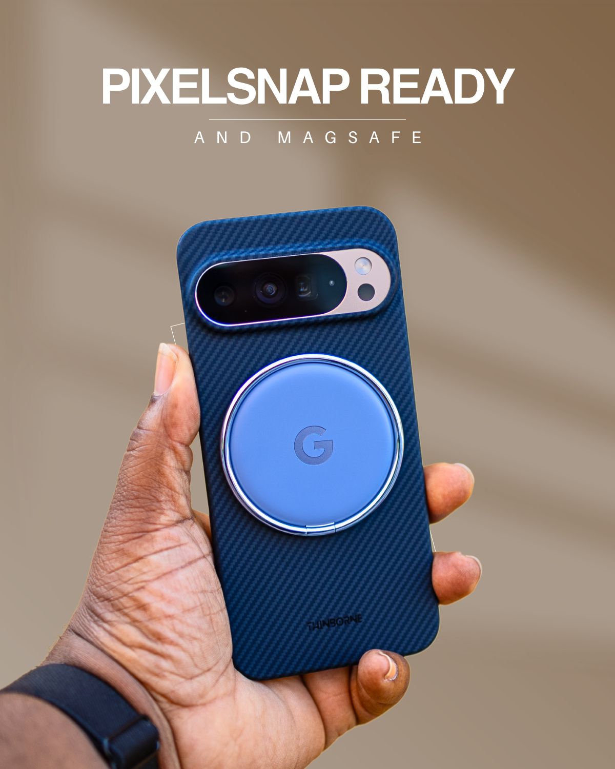 A hand holds a phone with a dark blue, woven Pixel 10 Pro xl case that has a light blue magnetic accessory with a 