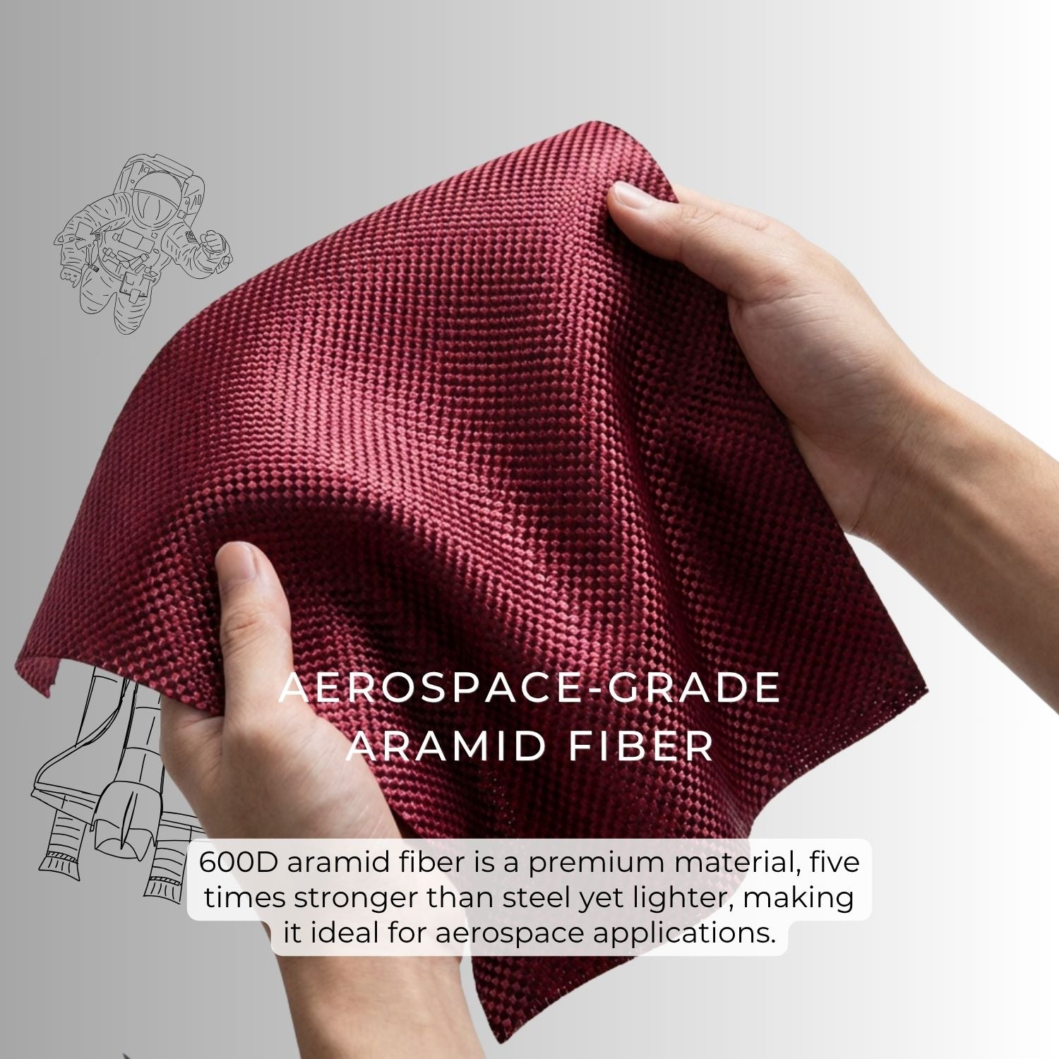Two hands displaying a piece of woven red 600D aramid fiber fabric, emphasizing its lightweight, durable strength.