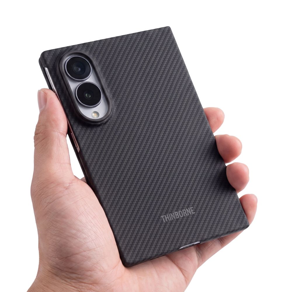 a hand holing galaxy z fold 8 with aramid fiber case
