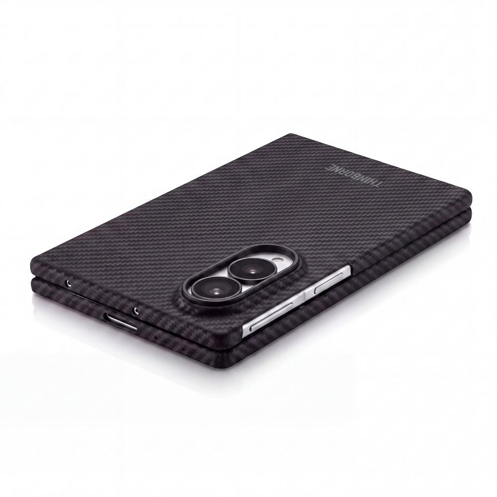 close shot of galaxy z fold 8 with aramid fiber case laying on the surface