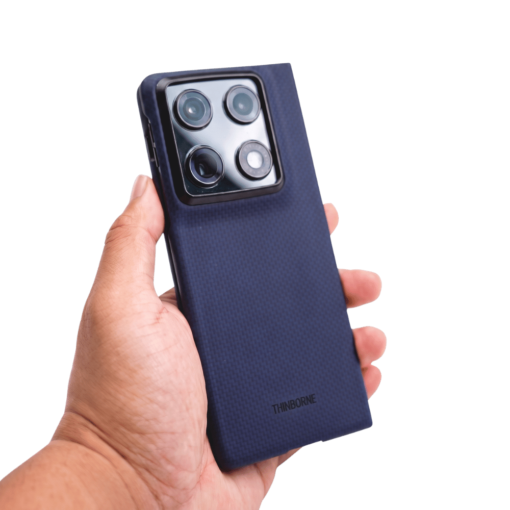 Hand holding a phone with a blue motorola razr fold case against a transparent background