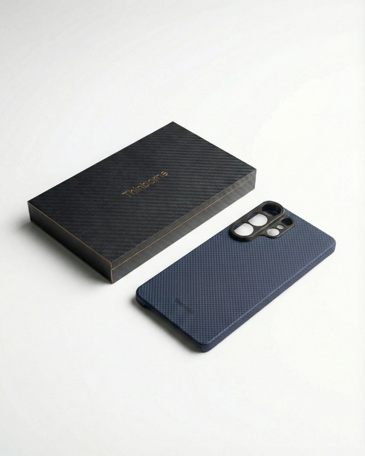 Blue samsung s26 ultra phone case with a matching box on a white background