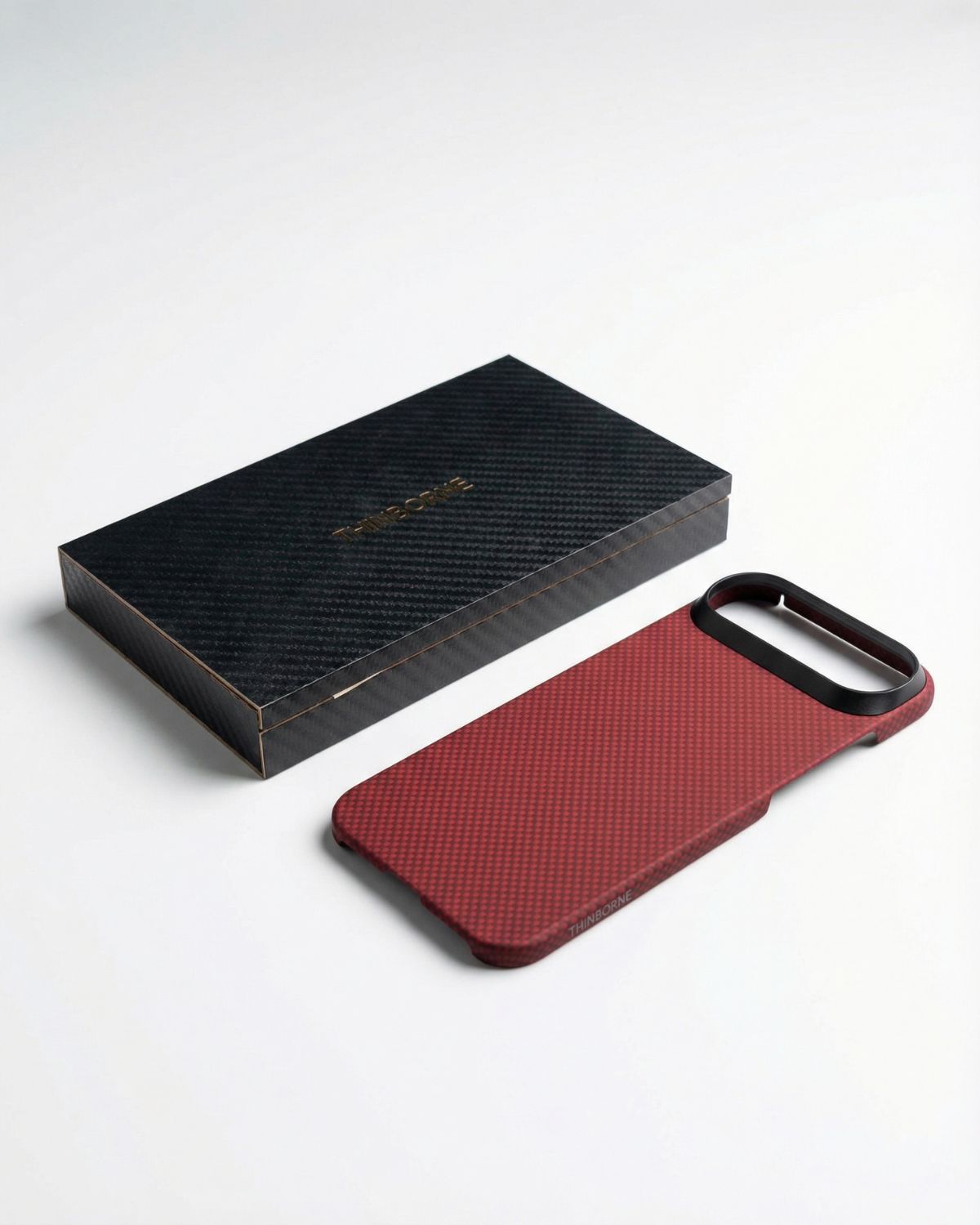 Red iphone air minimalist case with black textured pattern and black box on a white background