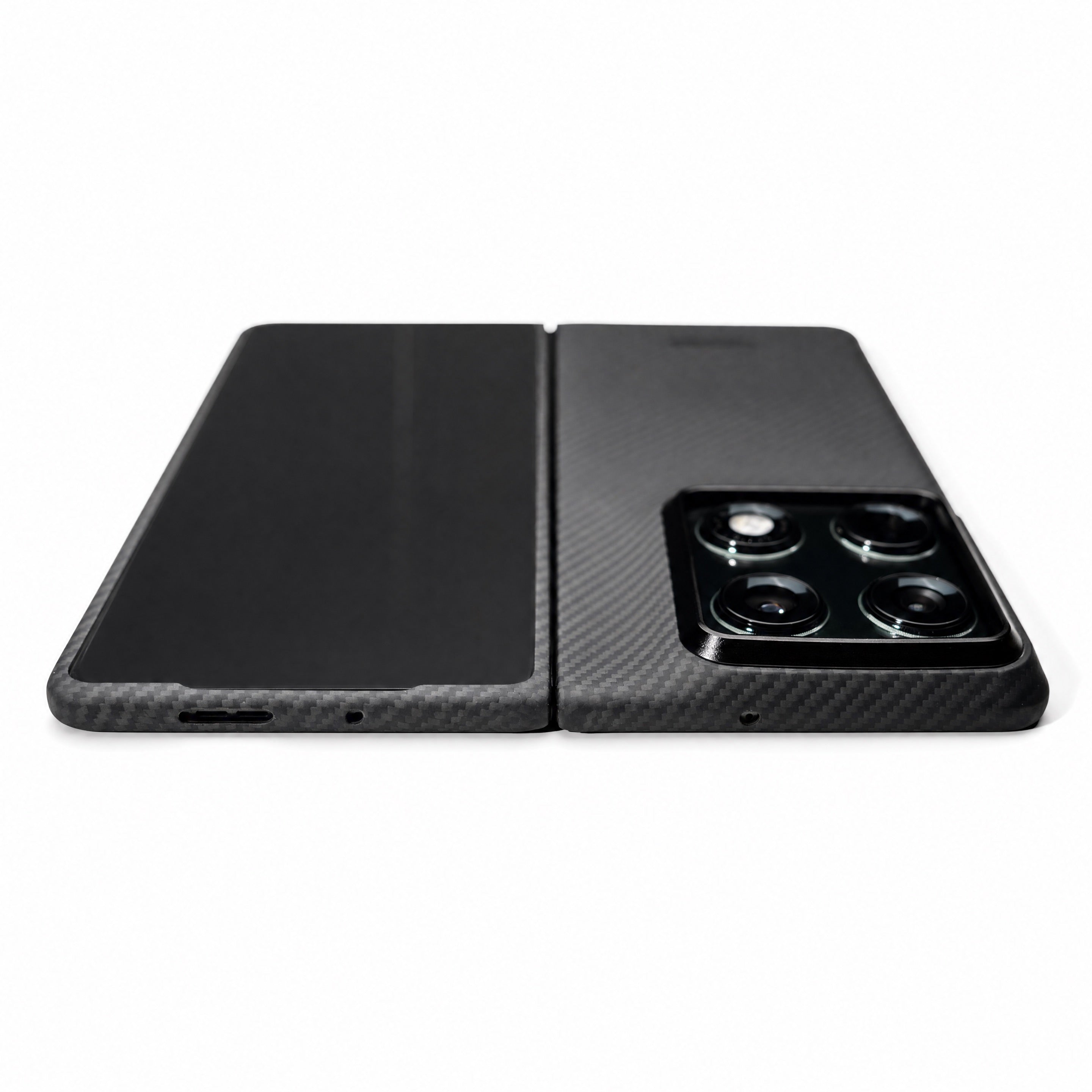 Black motorola razr phone case with carbon fiber texture on a white background