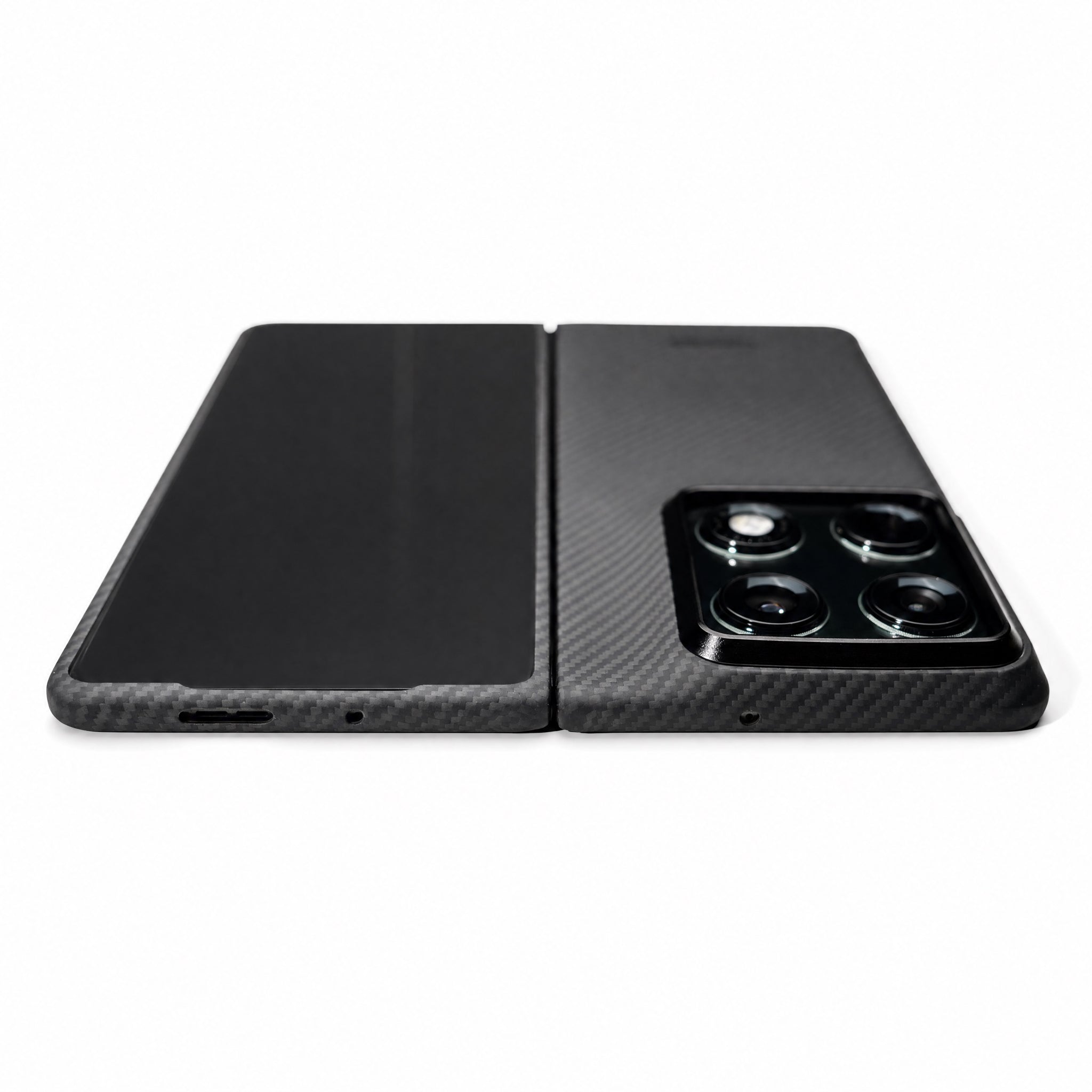 Black motorola razr phone case with carbon fiber texture on a white background