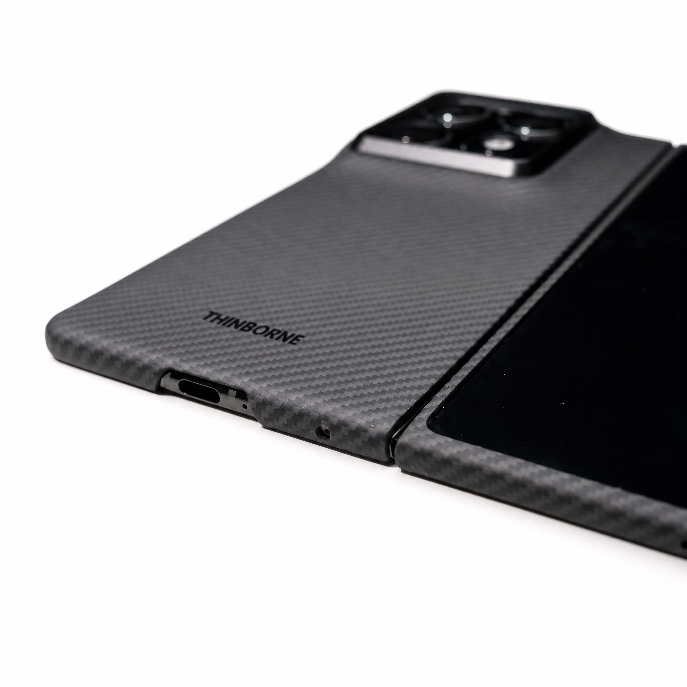 Black moto razr fold phone case with 'ThinBorne' branding on a white background