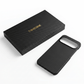 A black carbon fiber pixel 11  phone case shown next to its matching black presentation box with gold 'thinborne' branding, on a clean white background.