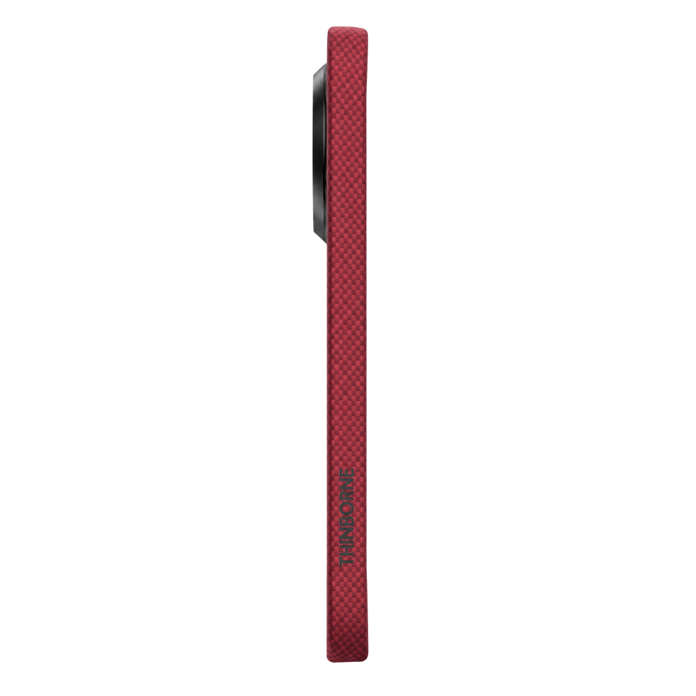 A slim red PIXEL 11 PRO phone case shown from the side on a solid green background, with a black camera cutout and vertical 'Safafar' branding printed on the lower half.