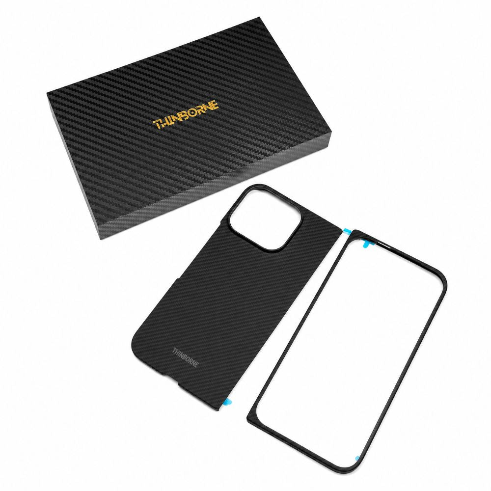 A black carbon fiber-pattern google pixel 11 pro fold  case set shown on a white background, including a fitted case, a separate inner frame piece, and the branded retail box.