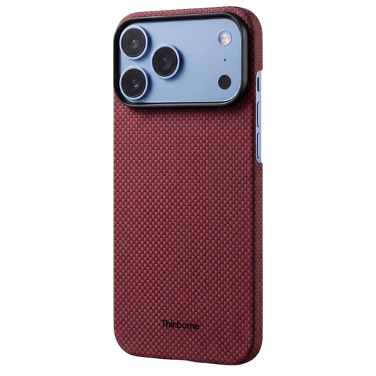 iphone 18 pro max with red aramid fiber case standing on the surface