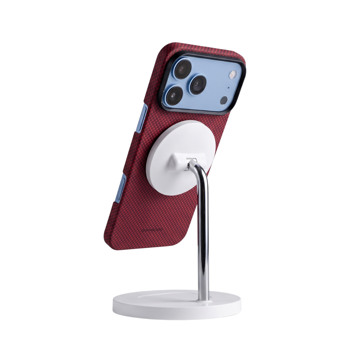 iphone 18 pro max with red aramid fiber case attached to magsafe stand charging