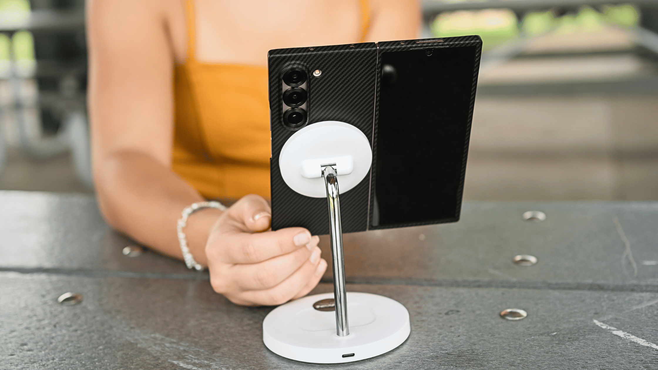 showing the phone with galaxy z fold 6 case attached to a magsafe stand .png__PID:e20e6e42-34f5-4168-ac12-d5f0867640a5